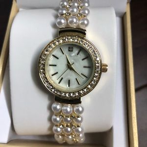 Gold pearl watch